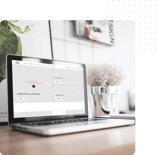 Een wireframe van een webshop op een laptop